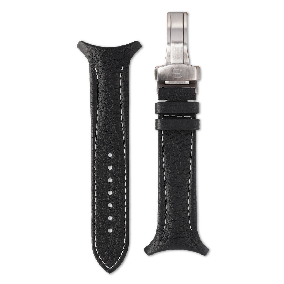 Black leather watch strap with silver clasp on a white background