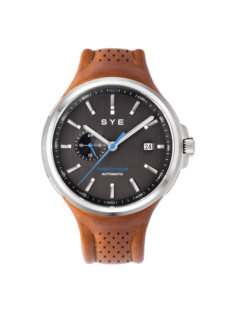 SYE watch with brown leather strap and black dial on a white background