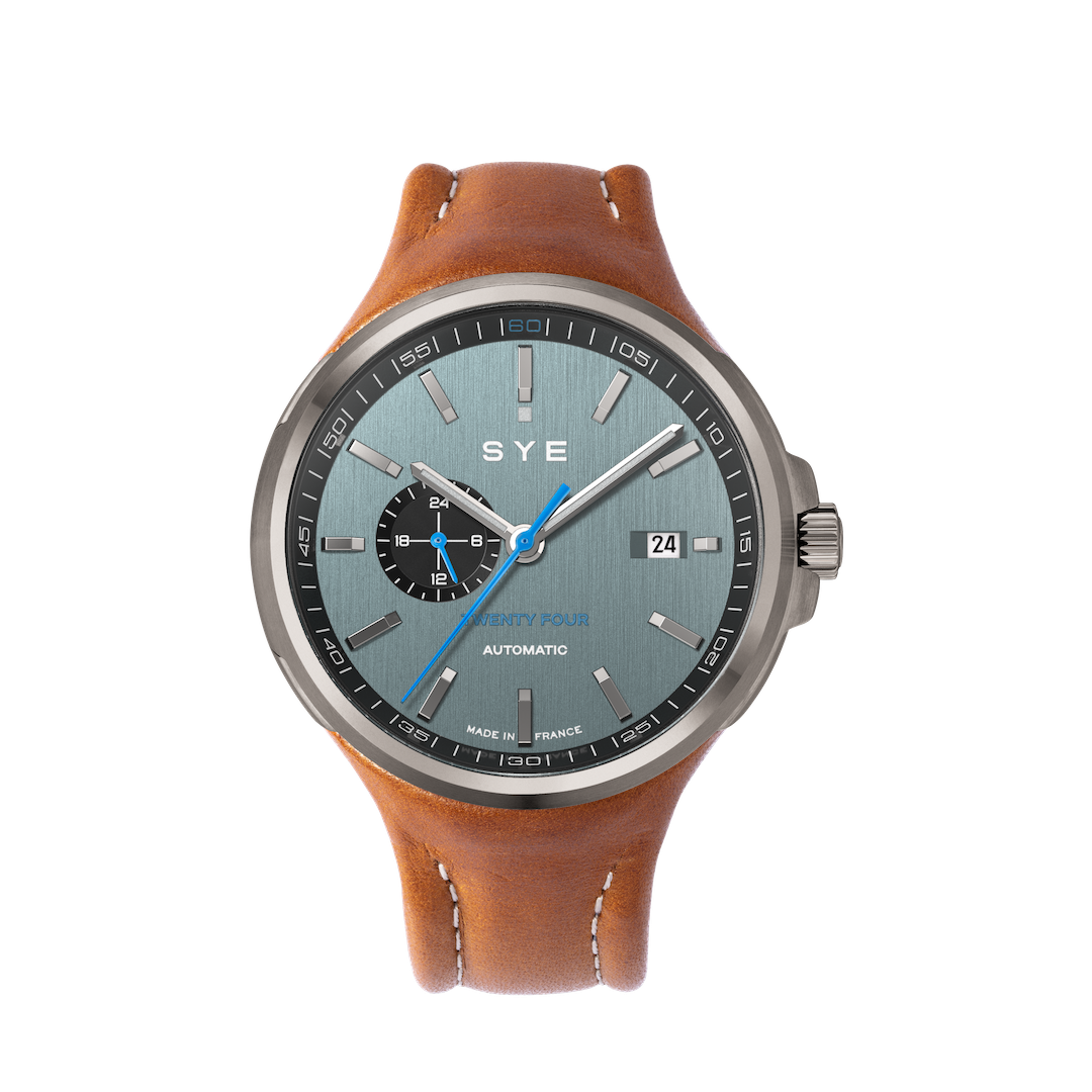 Watch with brown leather strap and blue dial on a white background