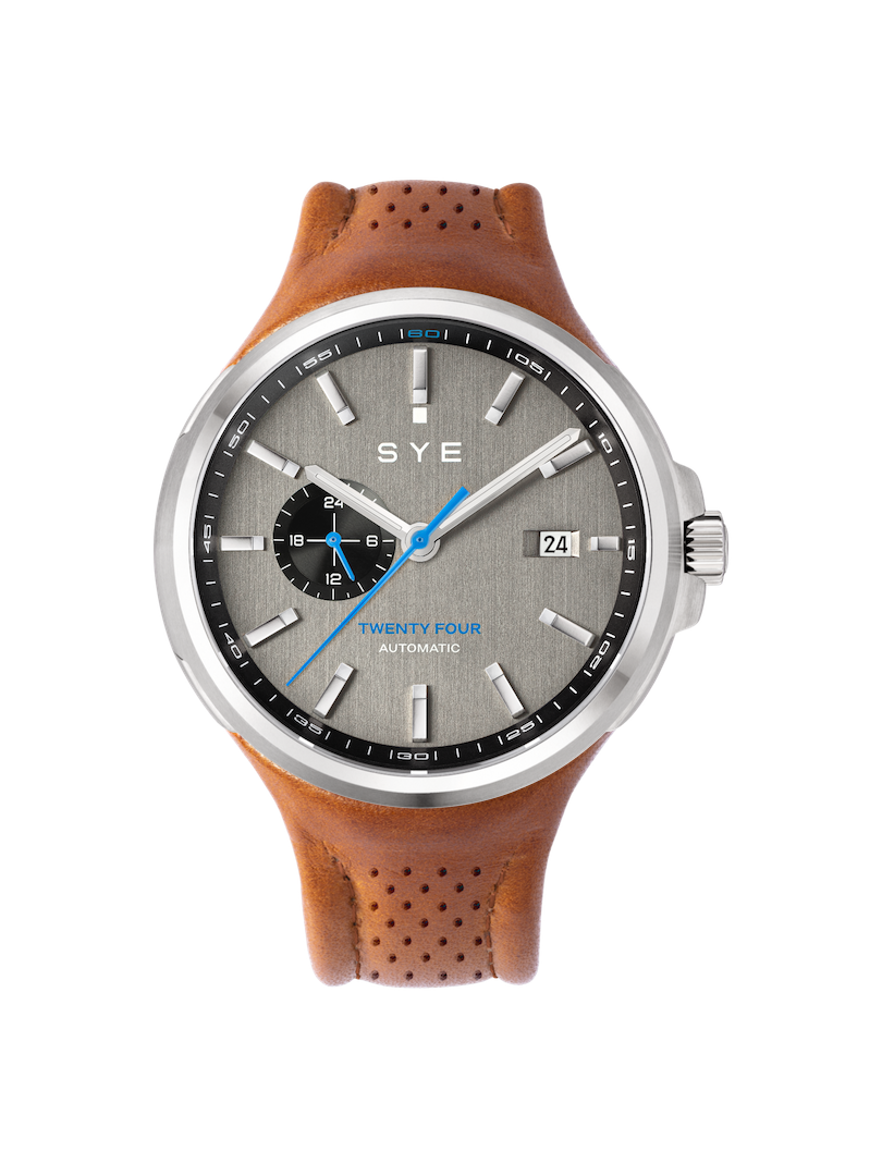 SYE watch with brown leather strap and gray dial on a white background