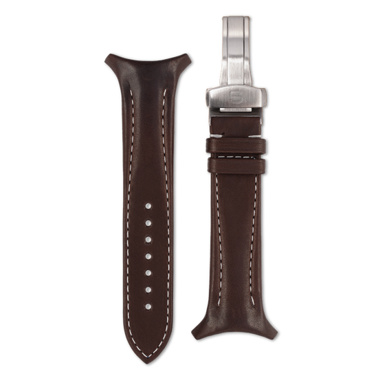Brown leather watch strap with silver clasp on a white background