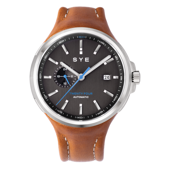 SYE watch with brown leather strap and black dial on a white background